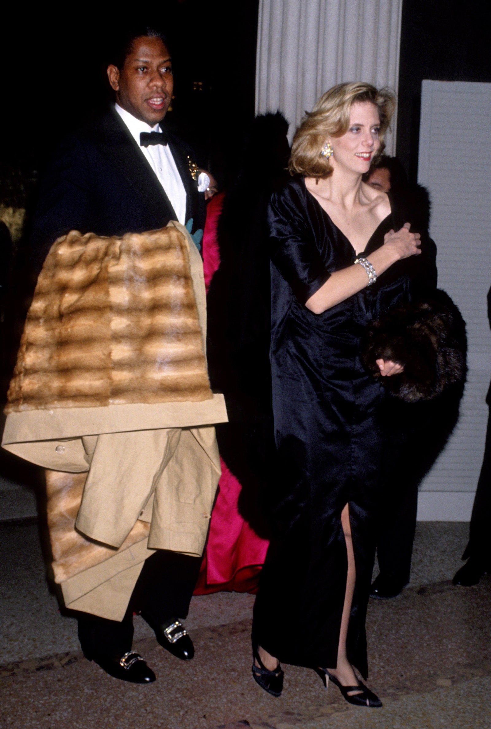 Images may contain Andr Leon Talley Clothing Jacket Formal Shoes Adult Jackets and High Heels