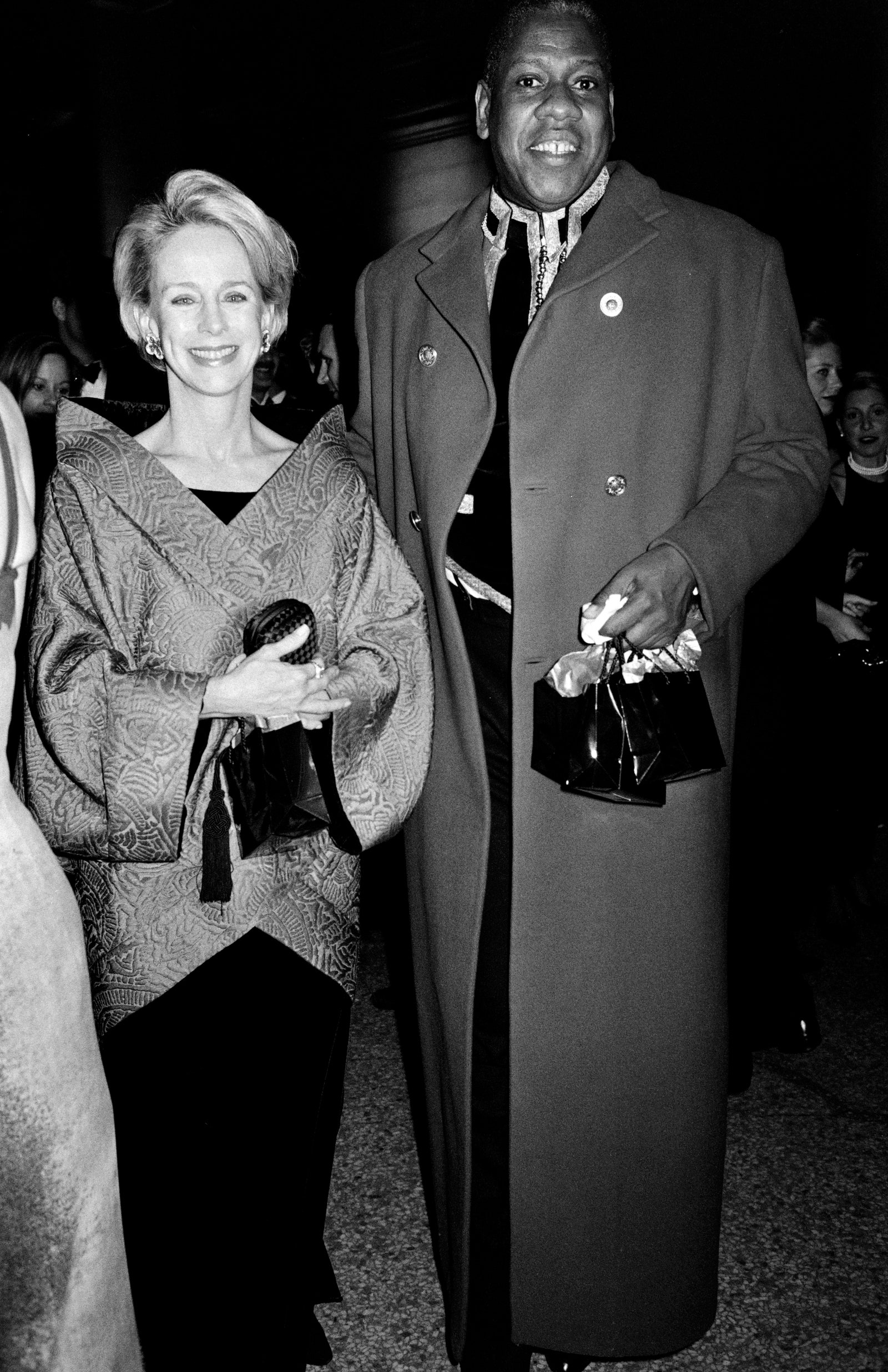 Images may contain Andr Leon Talley Clothing Jacket Accessories Tote Bag Adult Wallet Jacket and Face