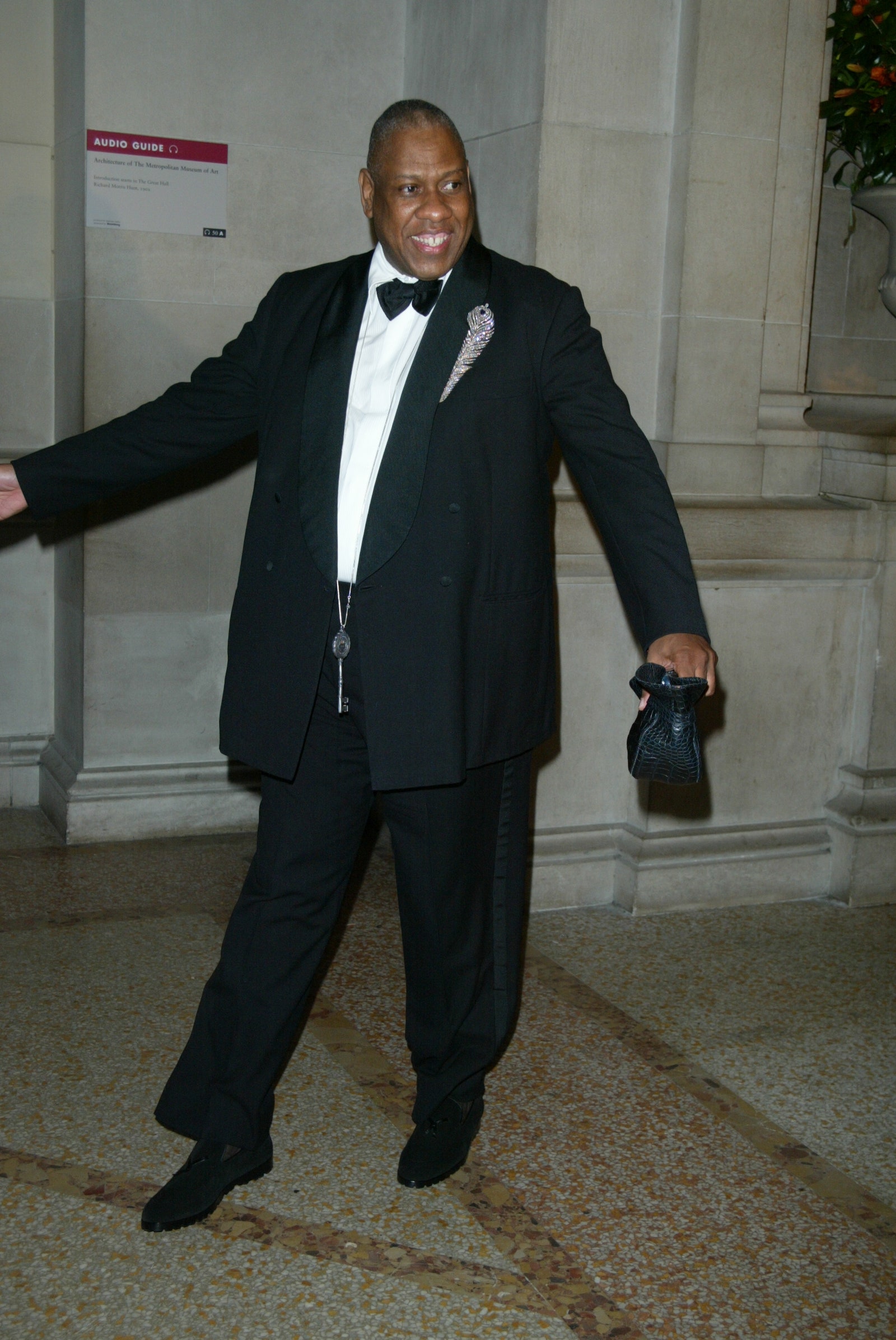 Images may contain Andr Leon Talley outfit formally wearing suit tuxedo and tie