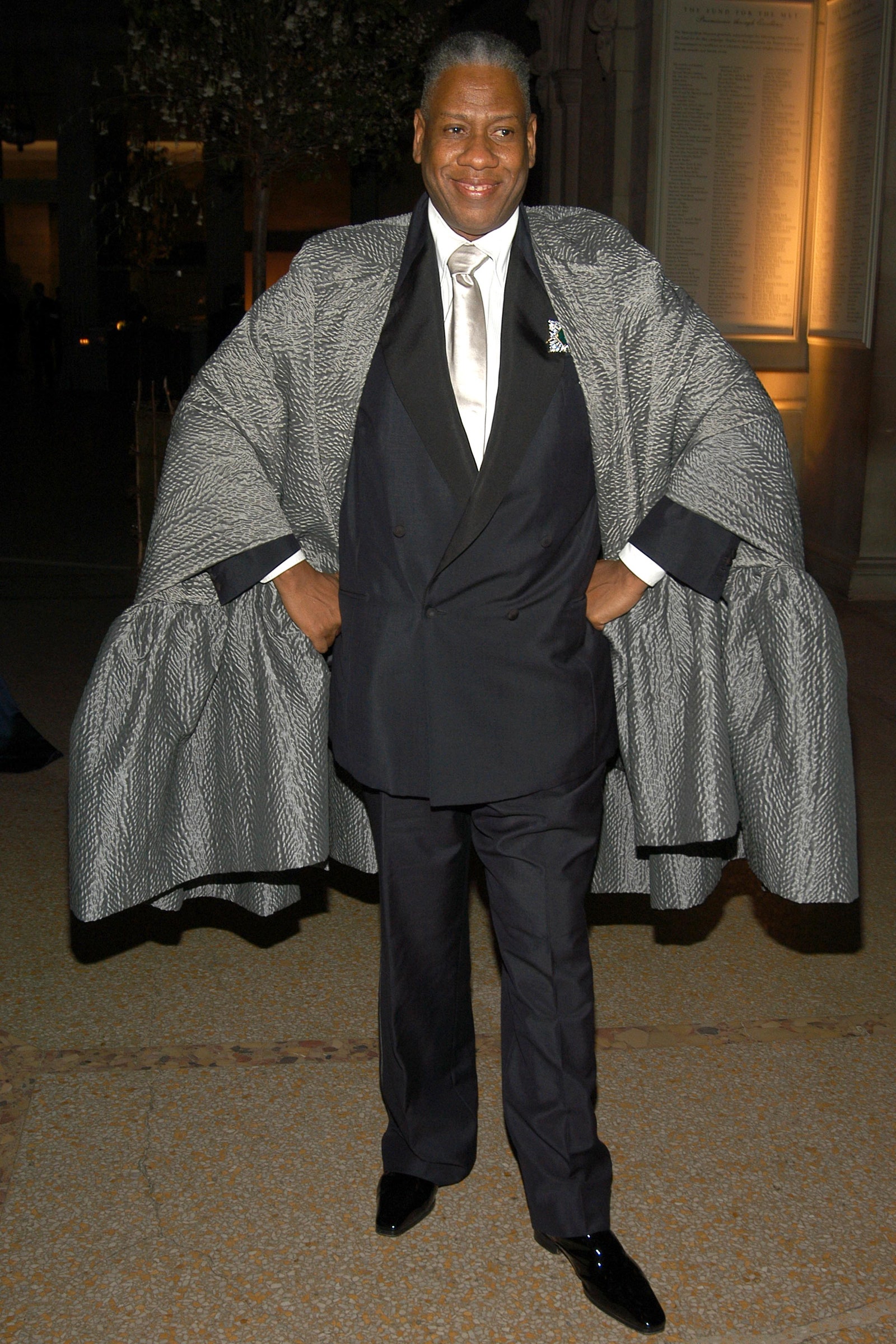 Images may contain Andr Leon Talley Fashion Clothing Blazers Formal Wearing Accessories Tie and Adults