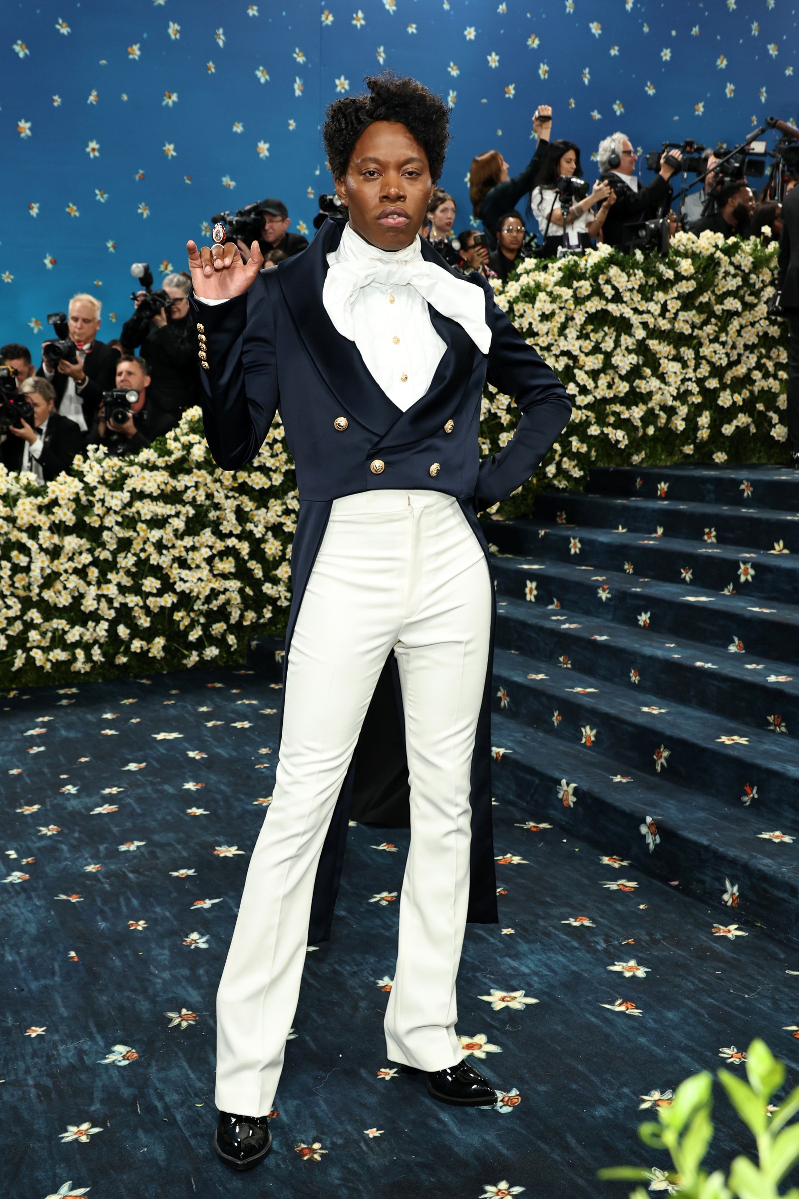 Images may contain blazer shoes adult formal wear suit photography and face