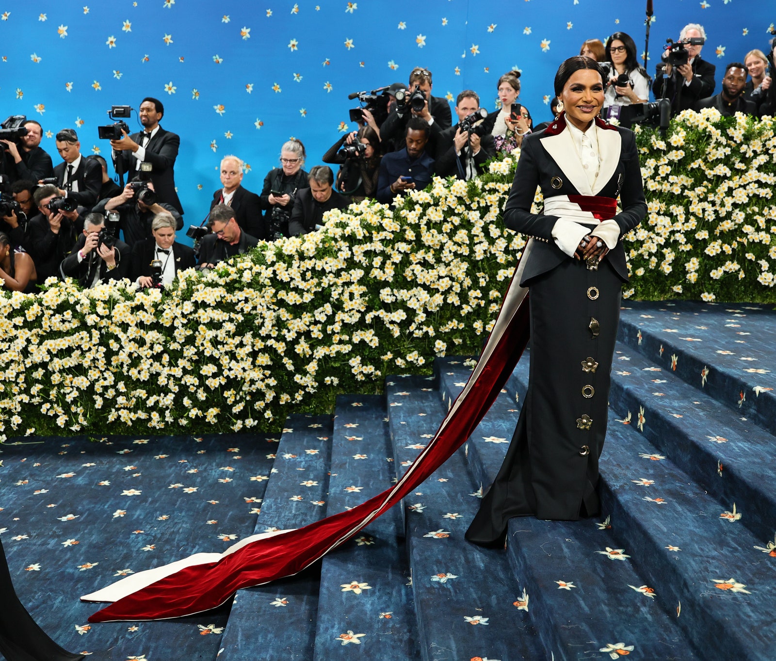 Images may contain Mindy Kaling Marcus Douthit Mike KellyMũKomawangũGĩGITRETLEGATOOSMAN GHAZI and Adults