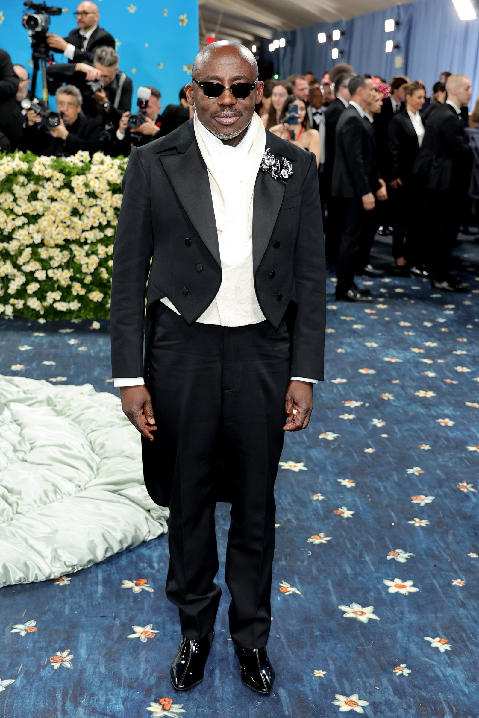 Images may contain Edward Enninful Jonathan Teplitzky Kimberly Hill Standing Outfits and Suits
