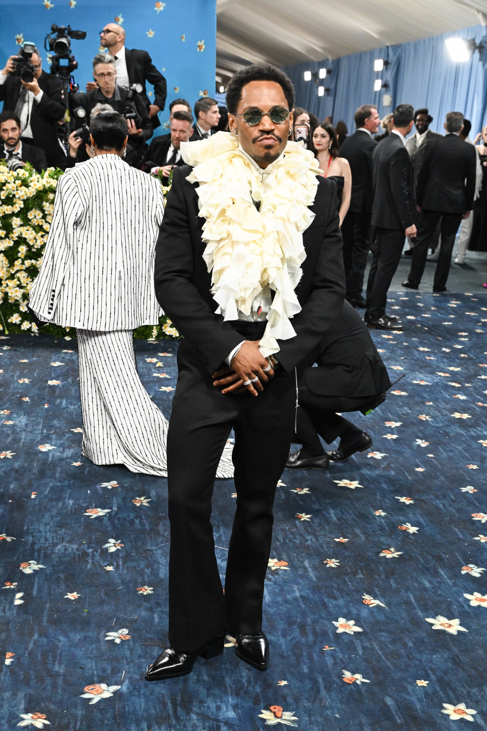 Images may contain Kaytranada Dawid Woliński Baldur Brönnimann Questlove blazer and formal wear