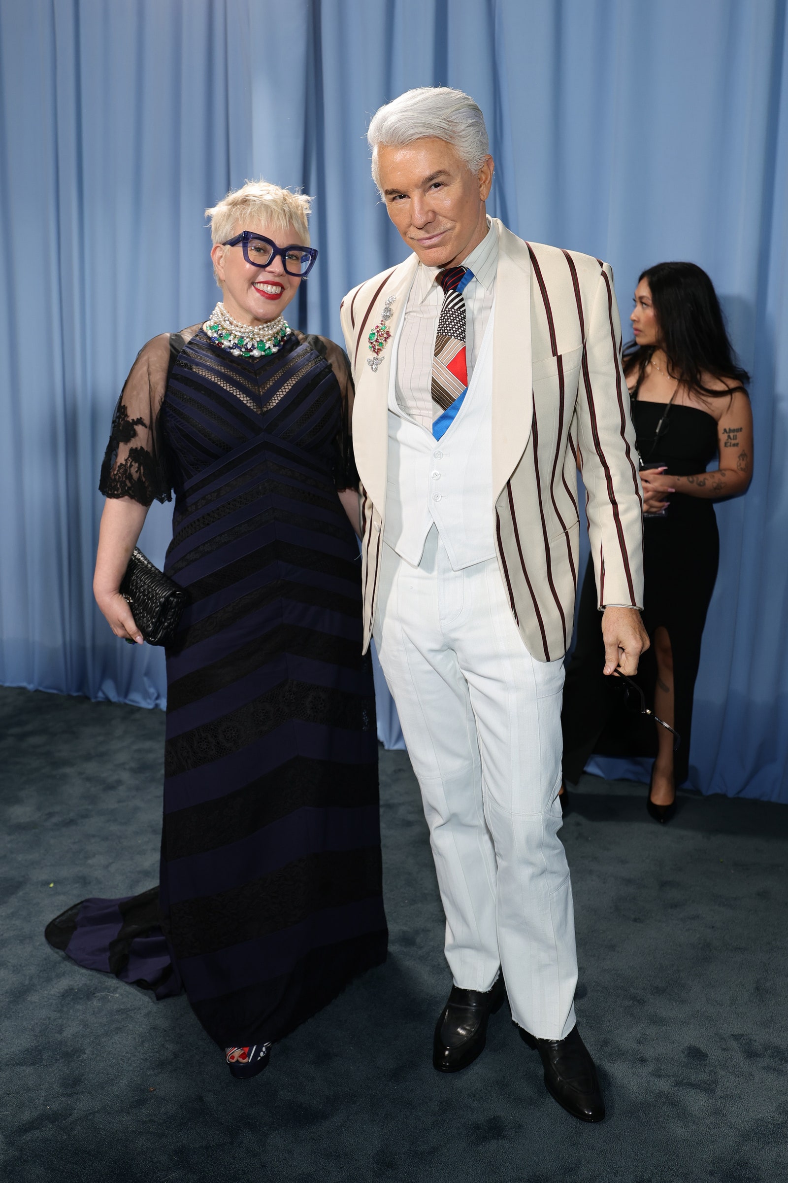 Images may contain Baz Luhrmann Catherine Martin Happy Salma Persone Accessories Adult formal wear and tie