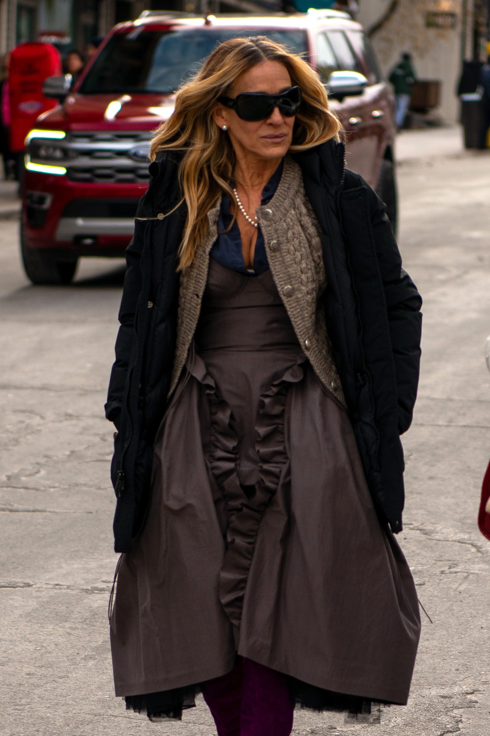Images may contain Sarah Jessica Parker clothing accessories glasses adult jewellery and necklace