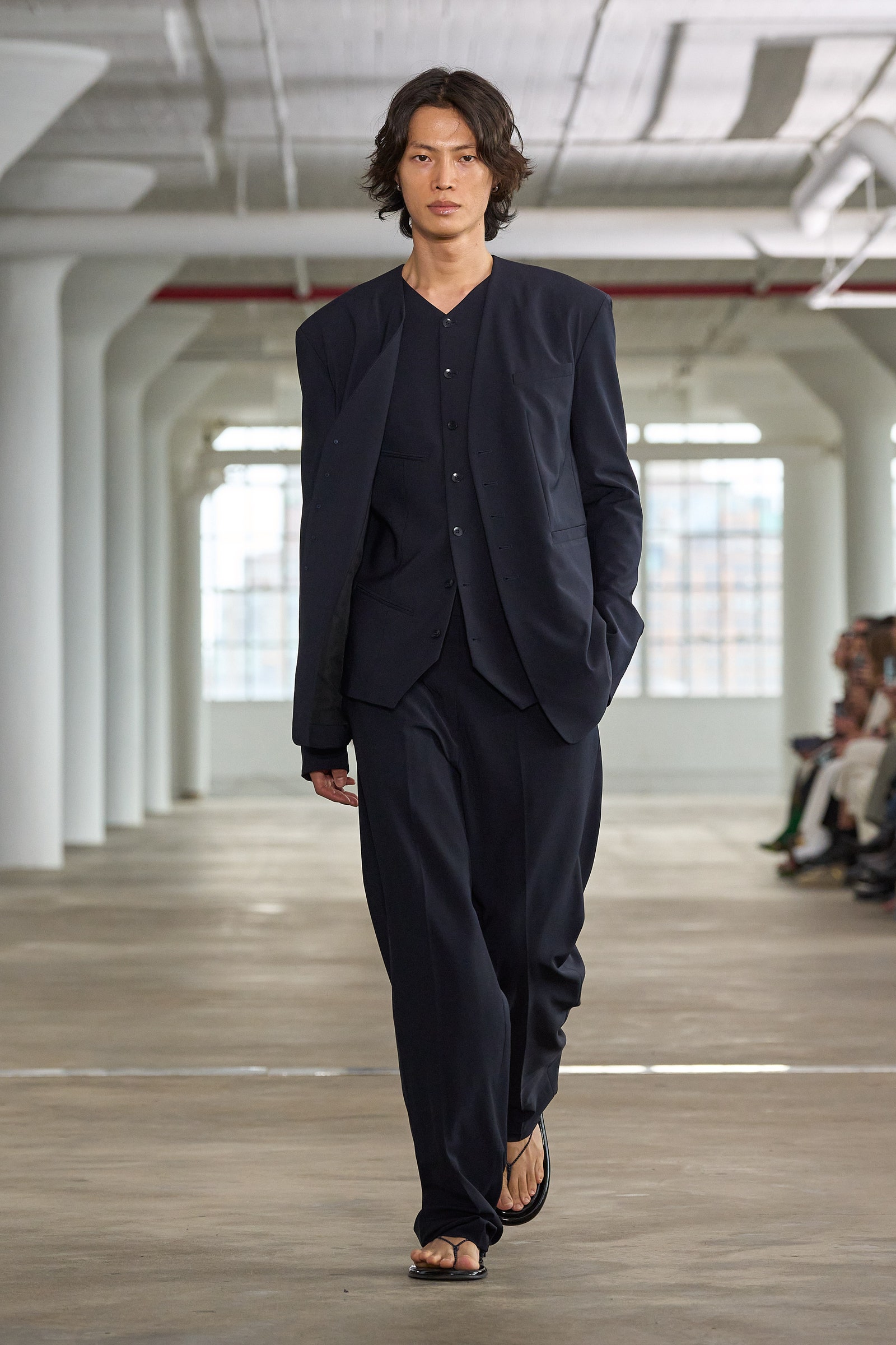 Images may contain clothing formally wearing blazer adult shoes sandals and standing