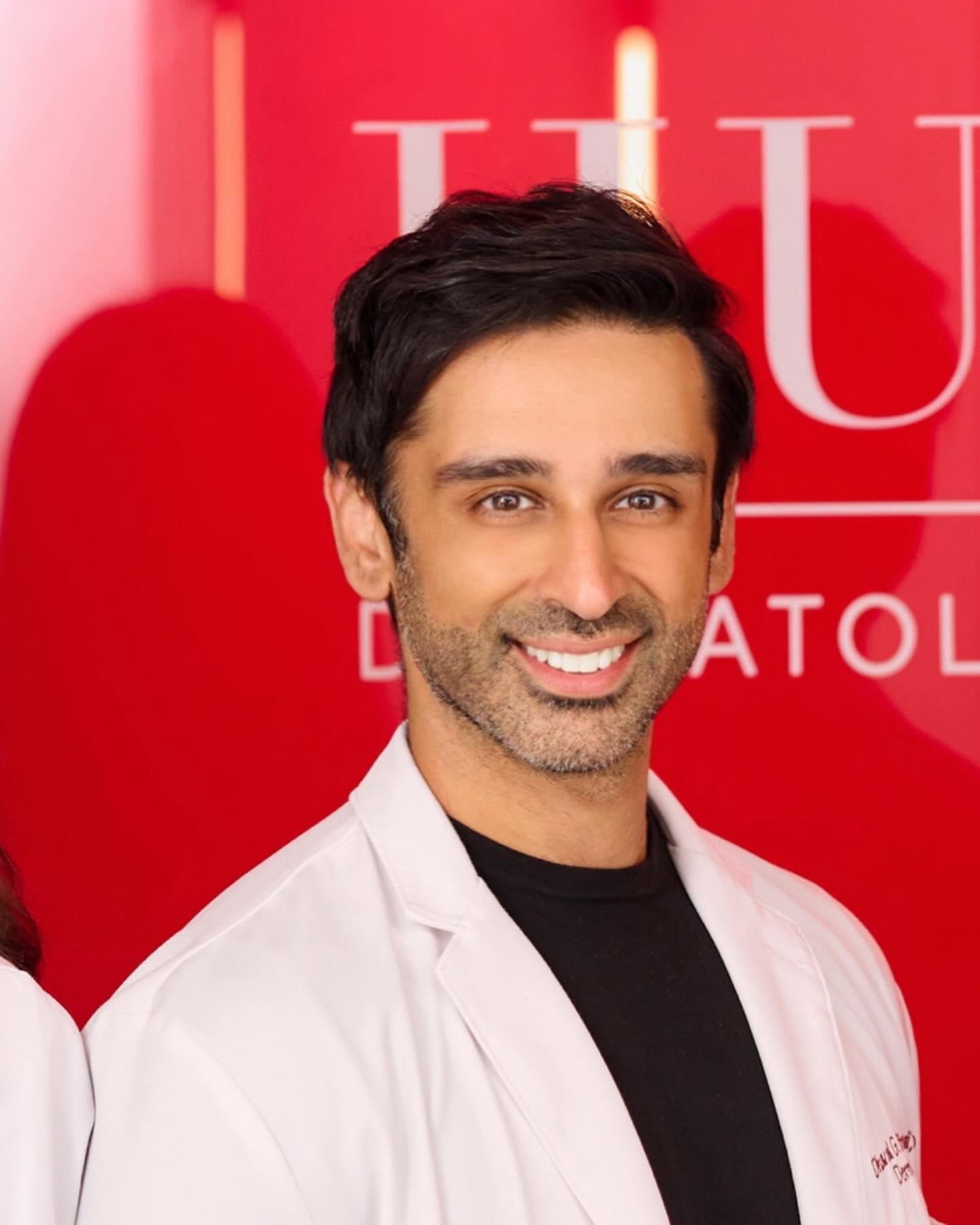 Images may contain Sami Khan Head Man's face dimples adult happiness and smile