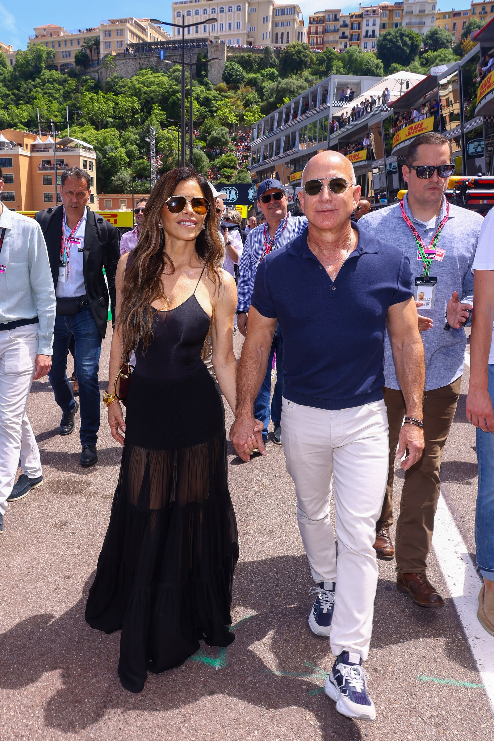 Images may contain Jeff Bezos Laura Snchez clothing shoes shoes accessories sunglasses glasses and bracelets