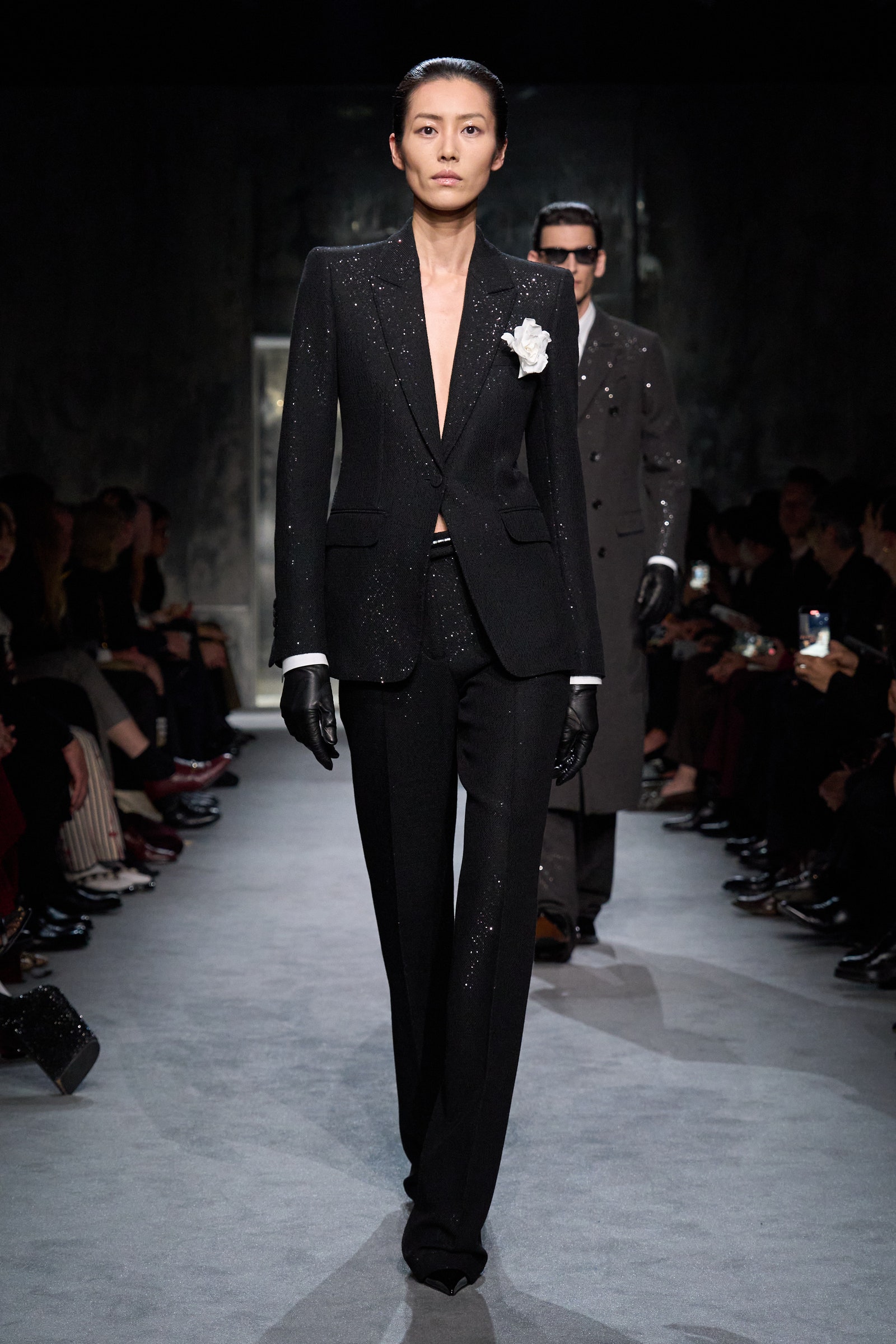 Images may contain Liu Wen Shaun Frank outfit, formally wearing suits and stylish gloves for adult accessories and glasses