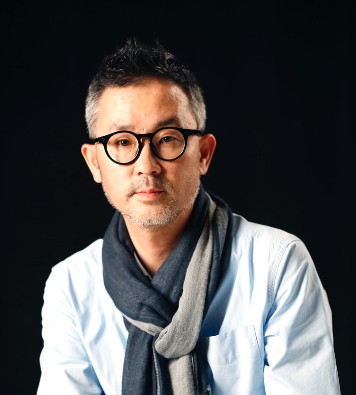 Image may contain Face Head Person Photography Portrait Adult Accessories Glasses Clothing and Scarf