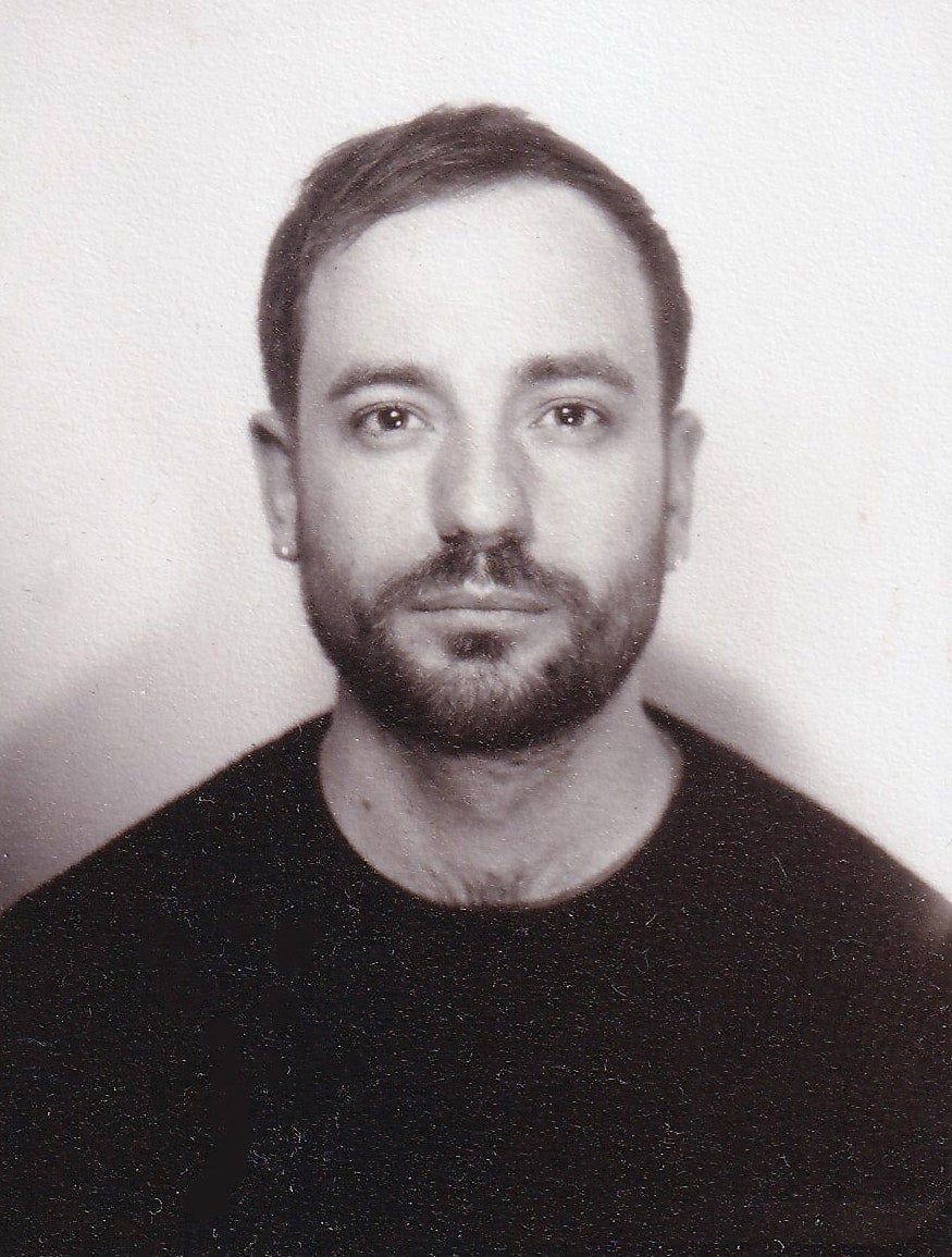 Image may contain Face Head Person Photography Portrait Beard and Adult