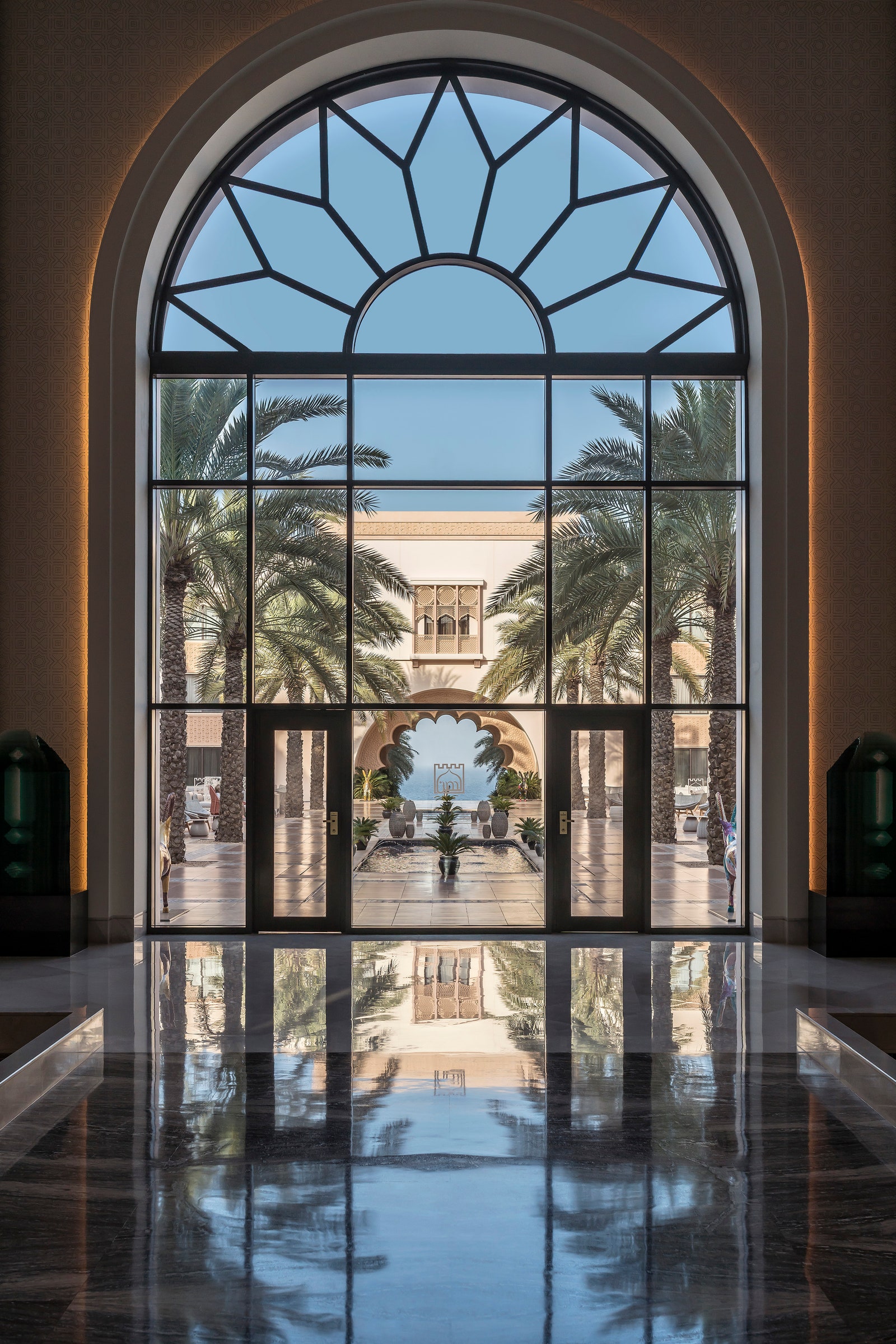 Images may contain French window arch construction factory and people