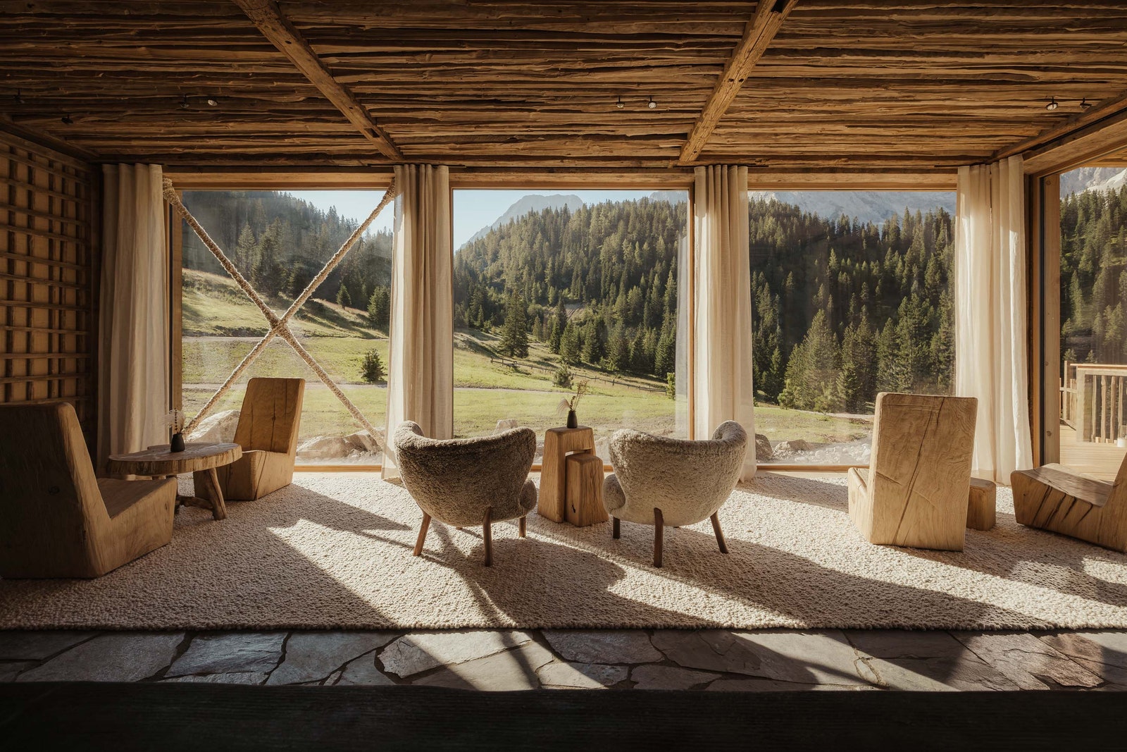 Images may contain interior design chairs furniture architecture hotel hotel nature and outdoor