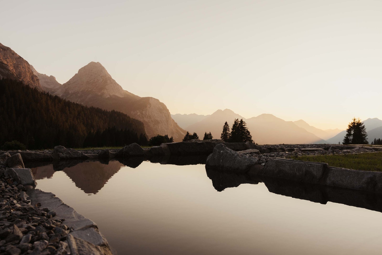 Images may contain landscape nature outdoor scenery mountains peaks wilderness plants trees and lakes