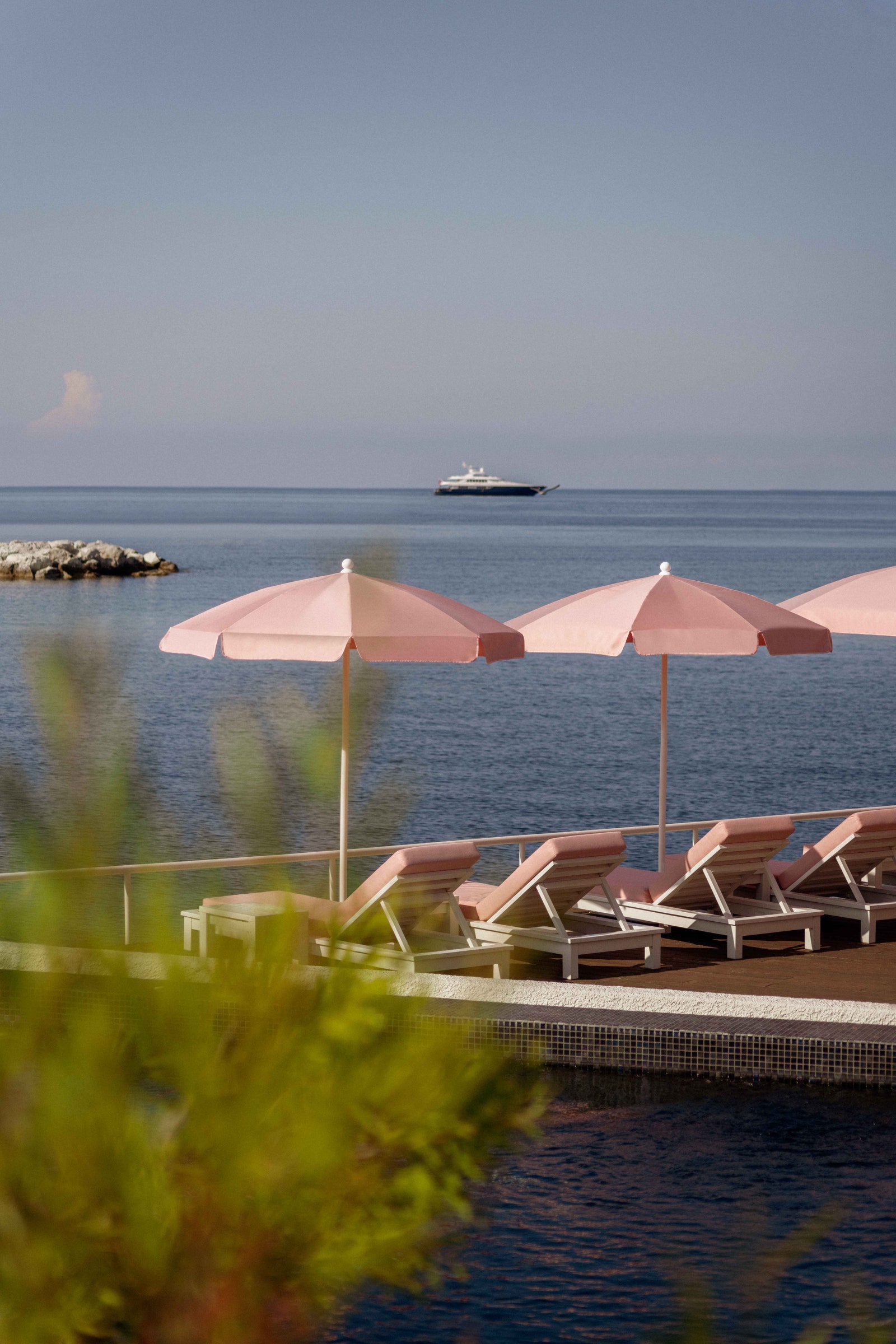 Images may contain seaside transport vehicles yachts in outdoor landscape boat chairs and furniture