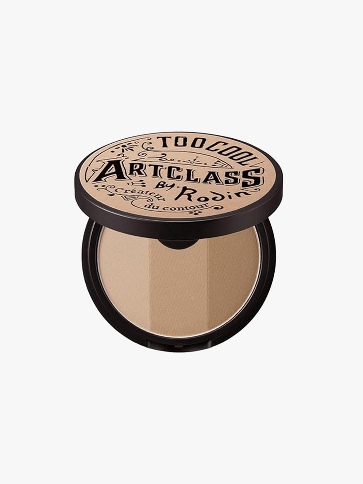 Image may contain: Head, Person, Face, Cosmetics, Makeup, and Disk