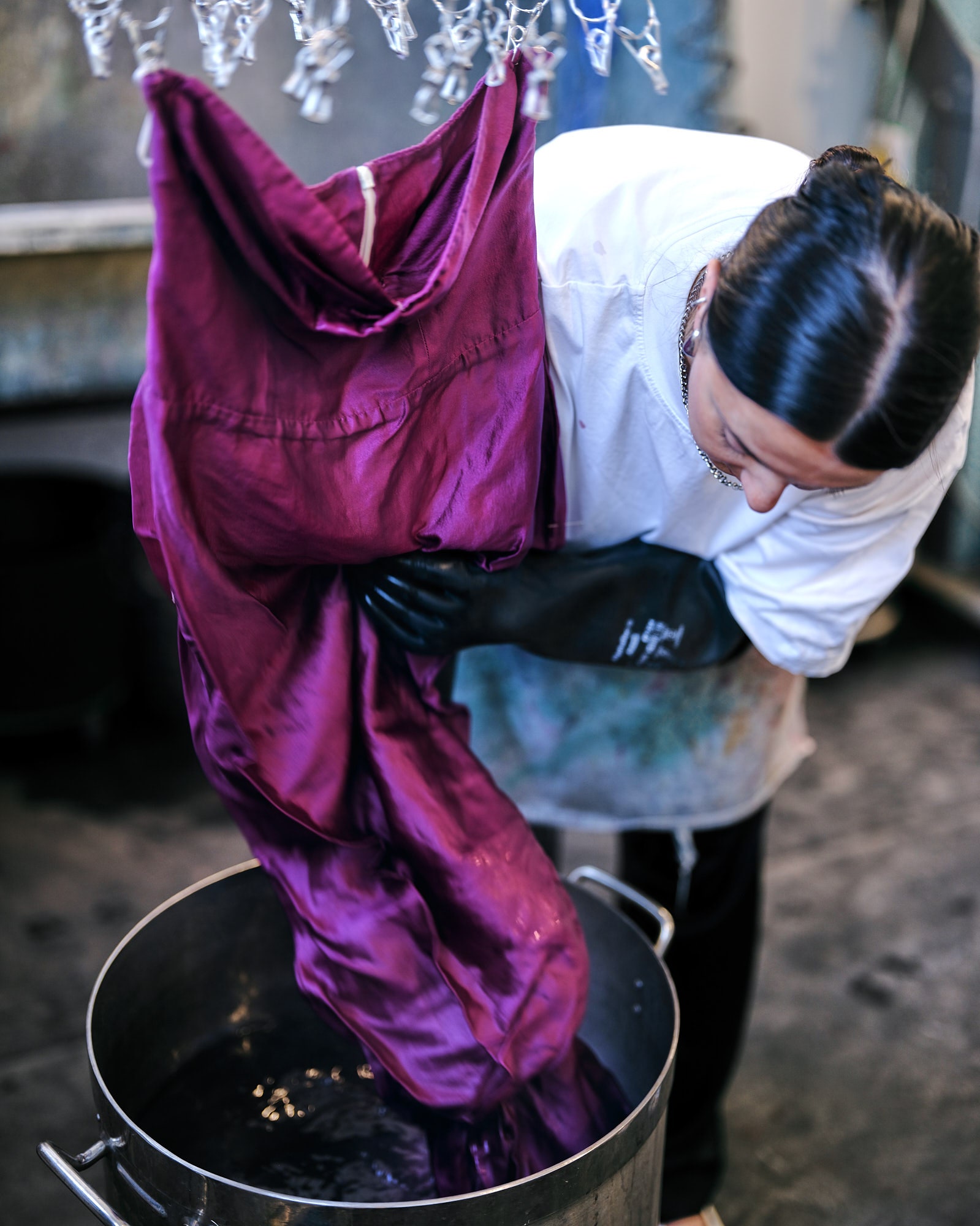 Images may contain clothing gloves adult dye accessories jewelry and necklaces