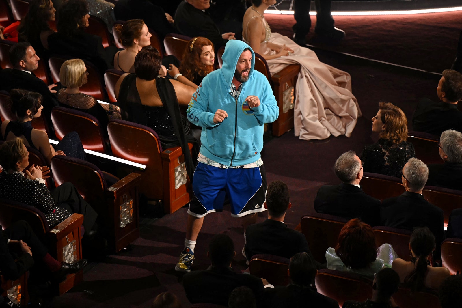 Images may contain Adam Sandler Madge Gill Slash People Ploting Shoes Adults and Kids