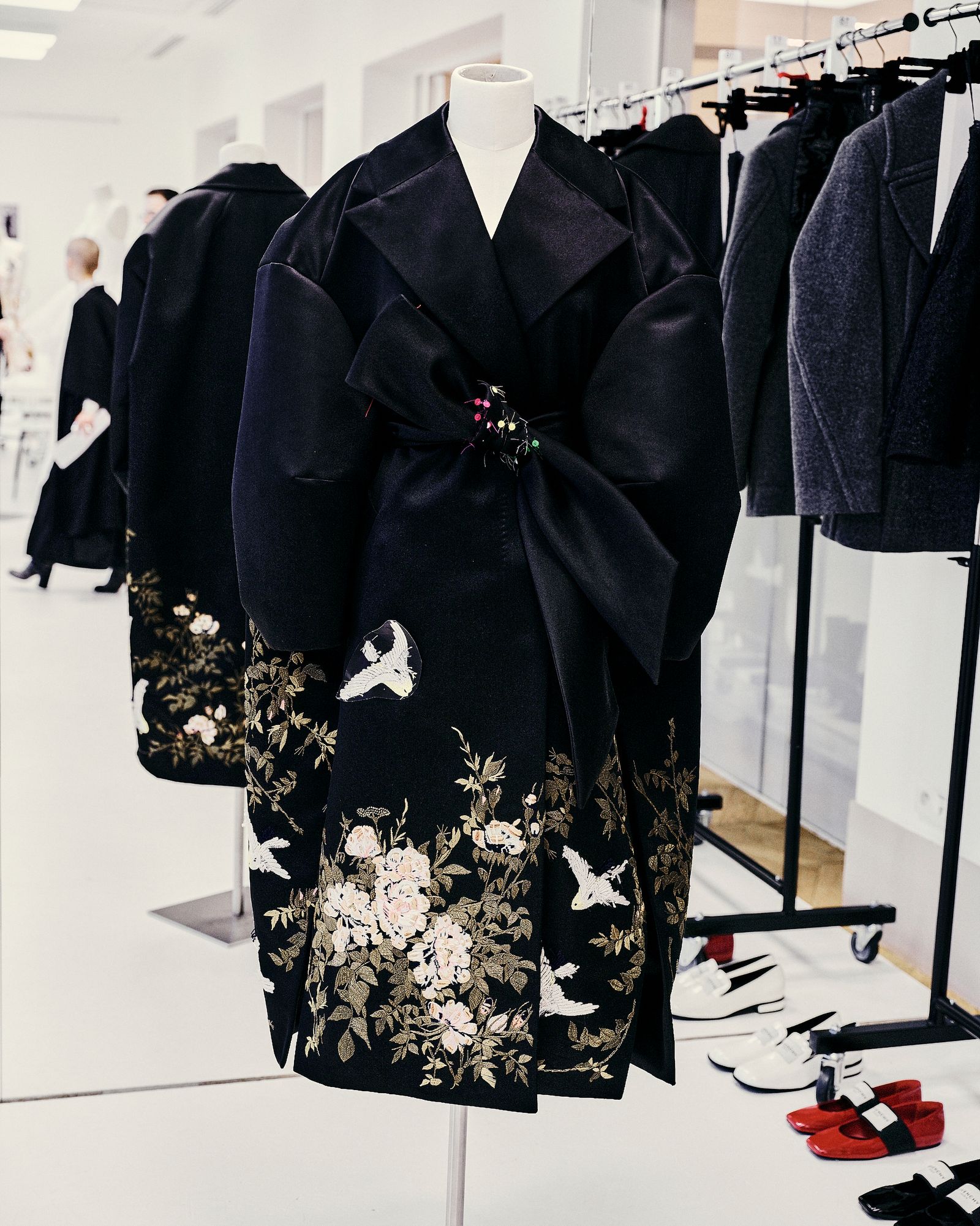 Images may contain formal clothes wearing stylish dress jackets and high heels adults and people