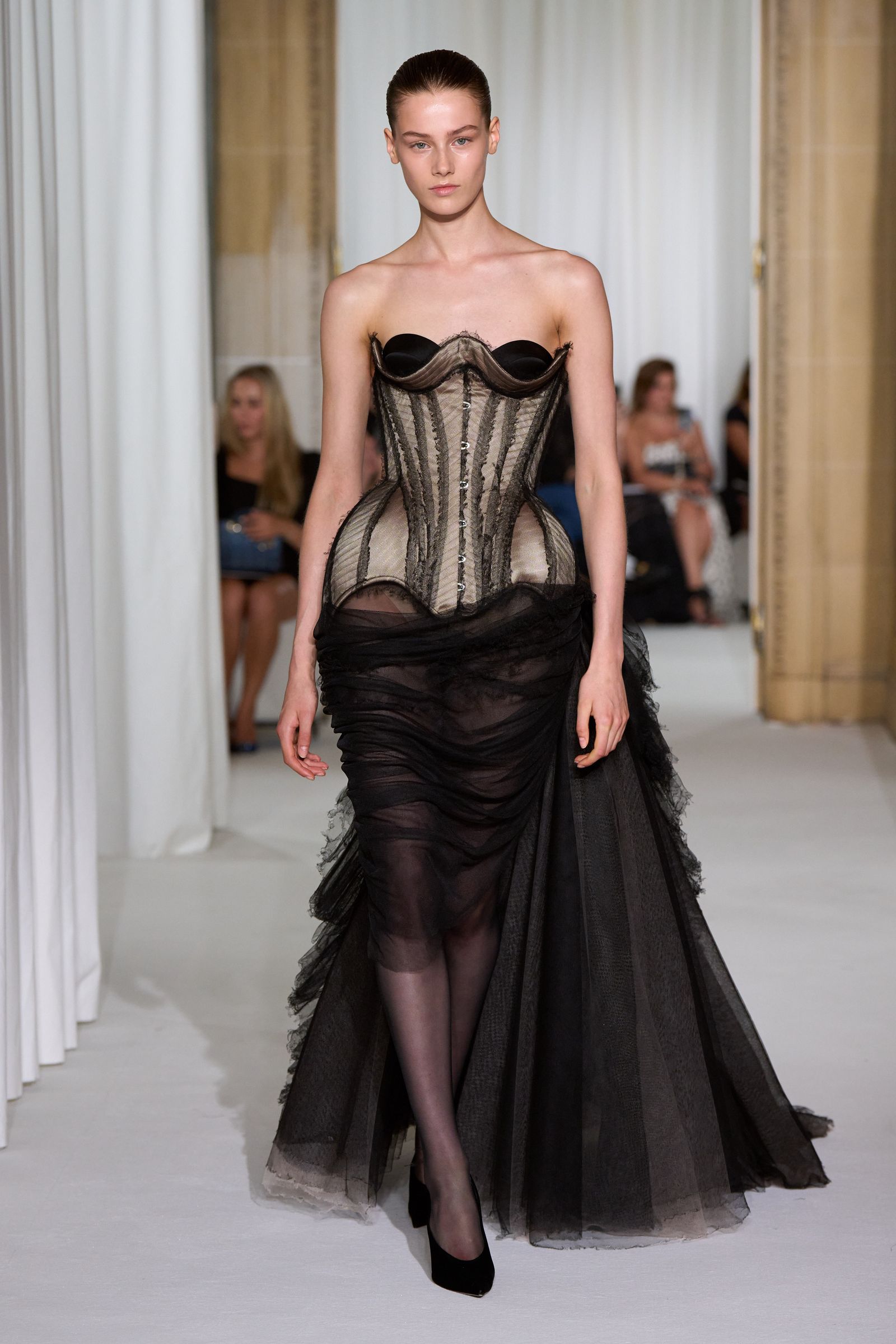 Images may contain stylish adult outfits, formally wearing heels and runways