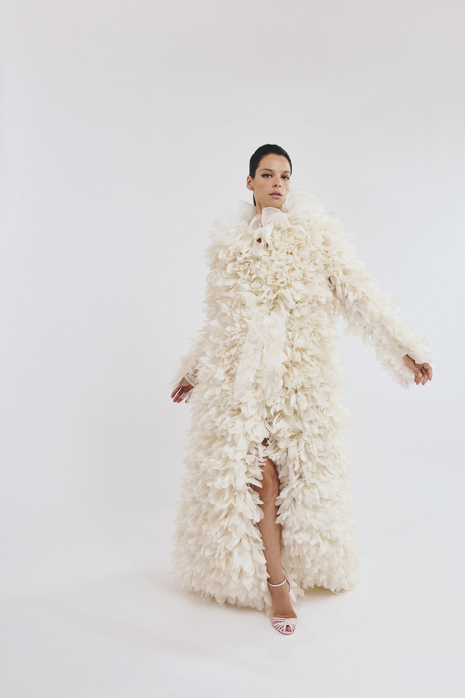 Images may contain adult wedding coats and stylish long sleeves