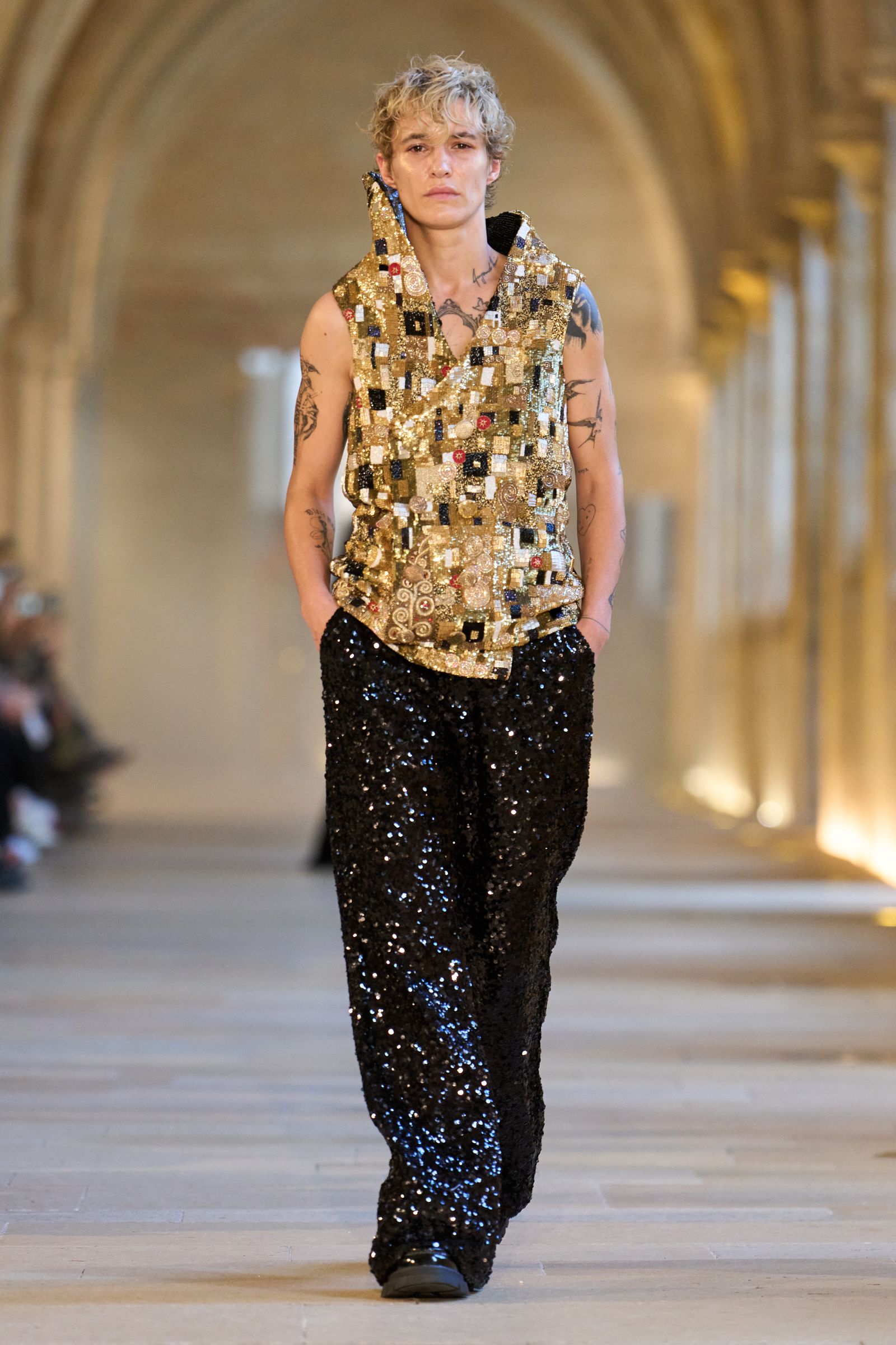 Images may contain adult clothing, footwear, fashionable shirt accessories, jewelry and necklaces