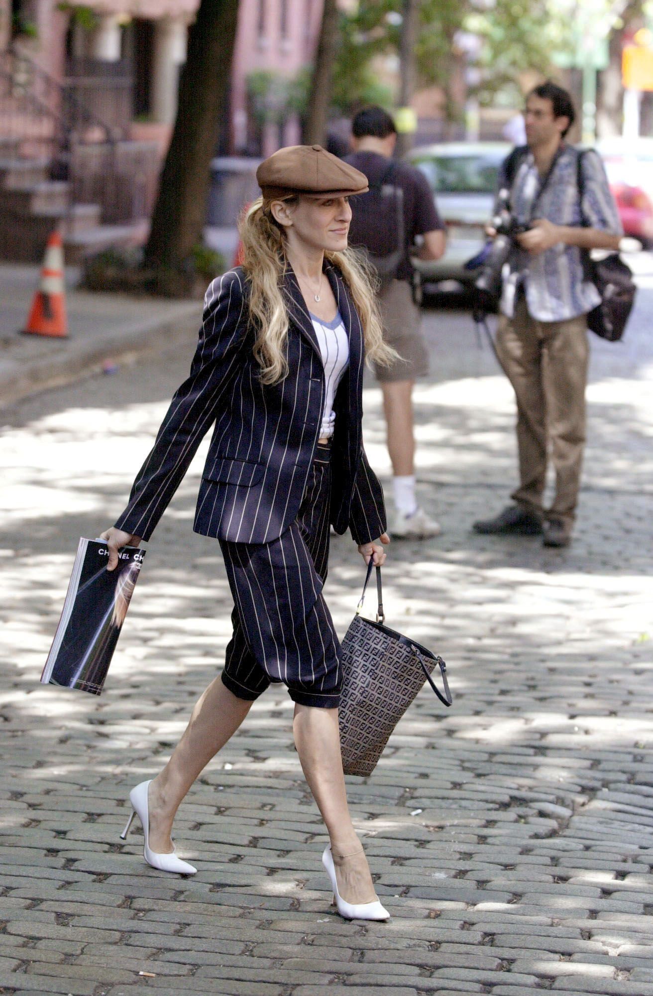 Images may contain Sarah Jessica Parker Accessories Bag Handbag Pedestrian Clothing Shoes and Heels