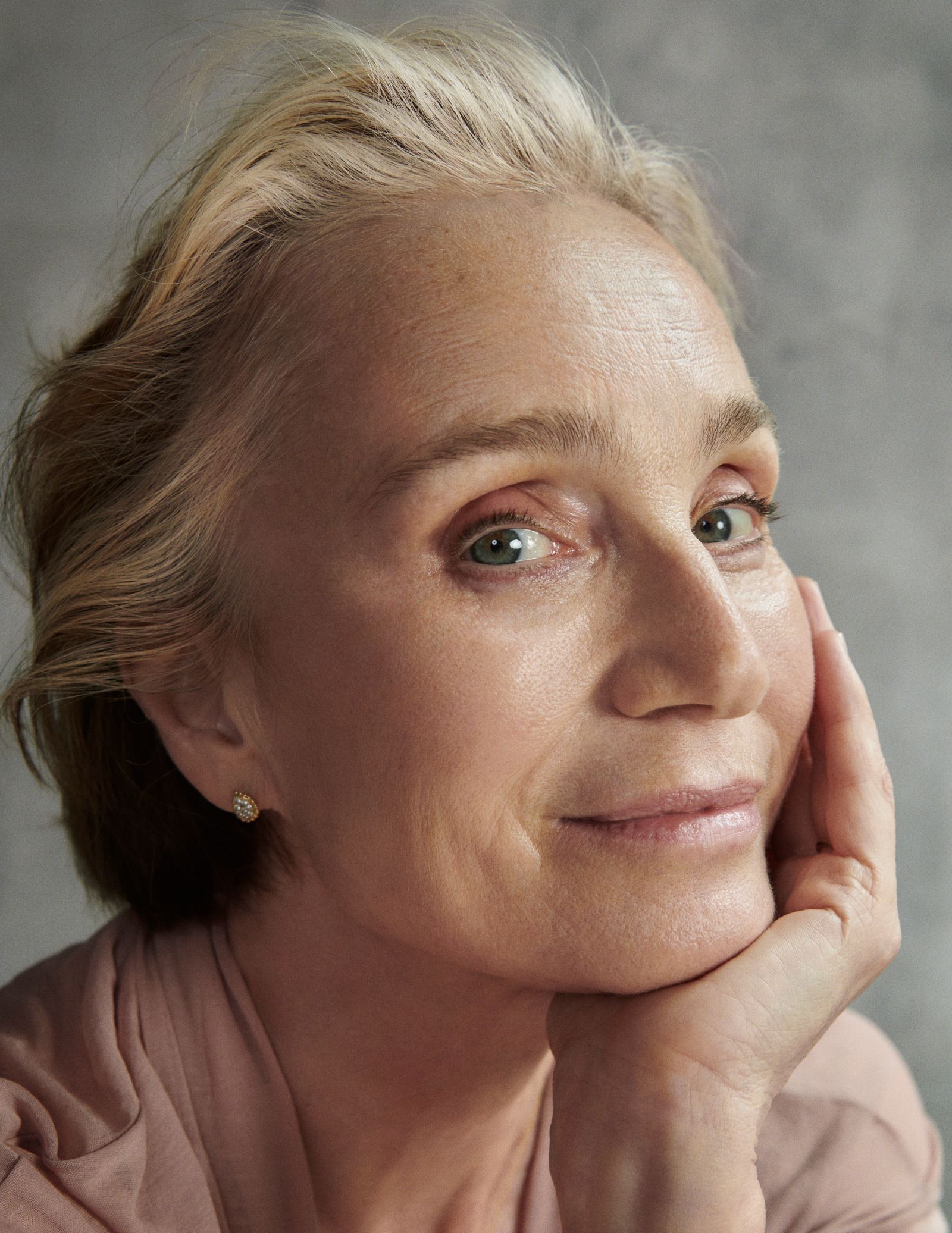 Images may contain Kristin Scott Thomas facial photography portrait adult blonde happy and smiling