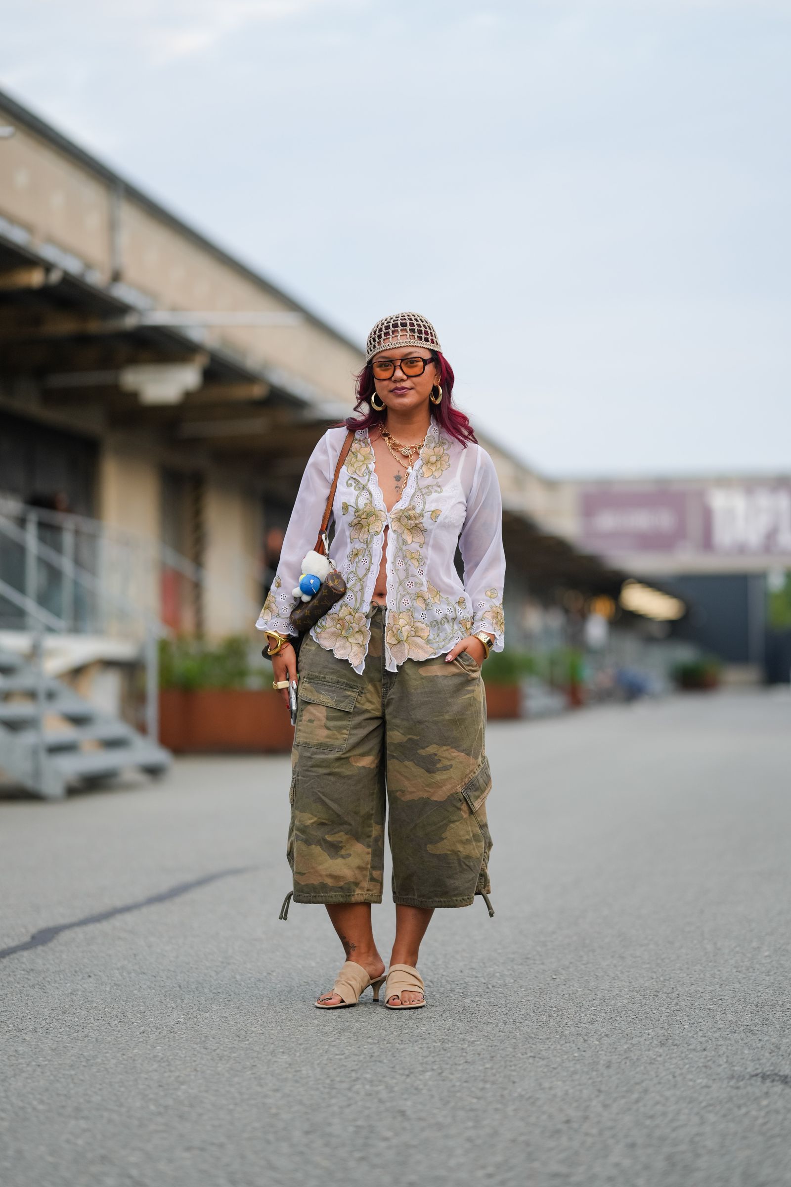 Images may contain clothes, pants, shorts, sandals, adult high heel accessories, glasses and bags