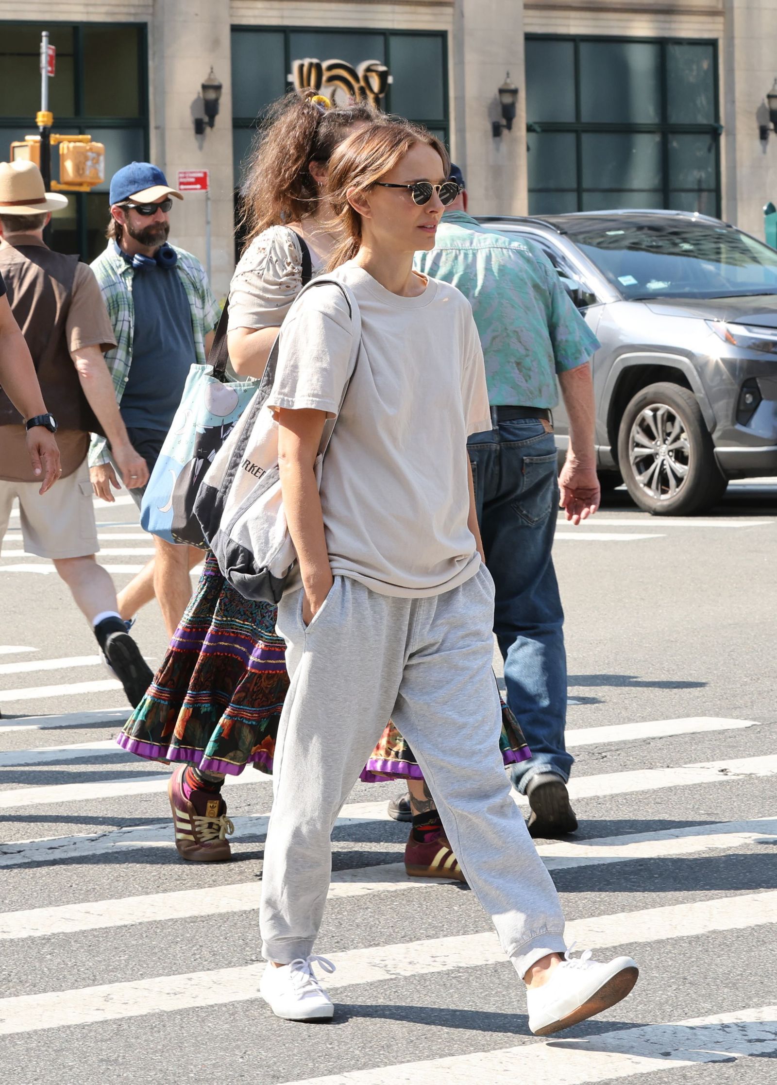 Images may contain Natalie Portman Heath Bell Pedestrian Clothing Shoes Hat Hat Accessories and Glasses