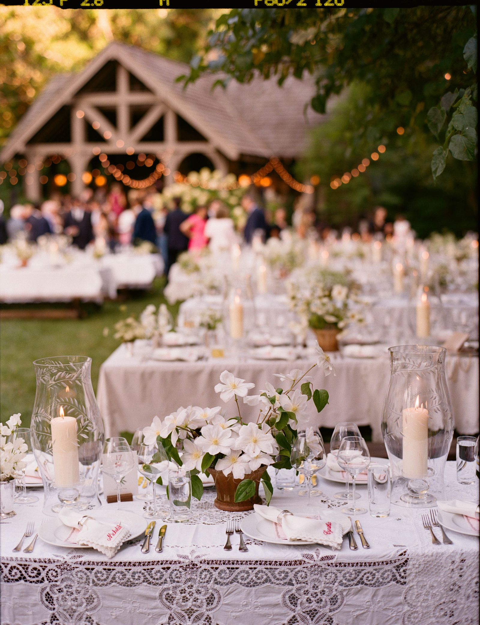 Images may contain cups, dining table furniture, table leaves, table utensils, forks and floral arrangements